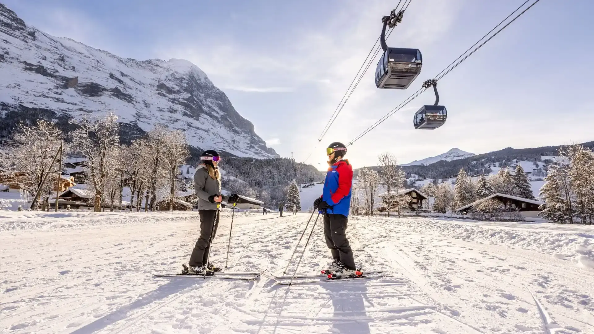 couple skiing in jungfrau ski region