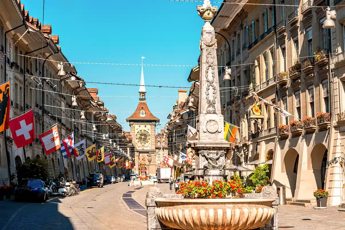 Street view on Kramgasse with fountain and Clock Tower