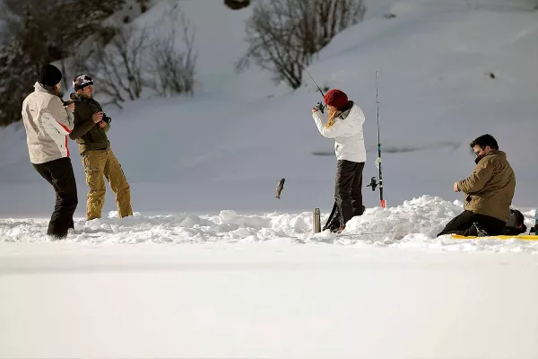 fishing on a frozen lake